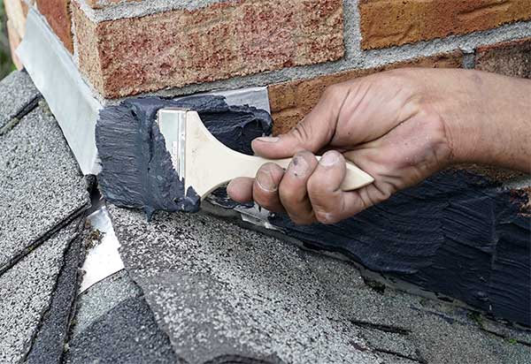 chimney leaking repair Nashua by 5 Star Chimney Service repairing flashing and waterproofing chimney safely