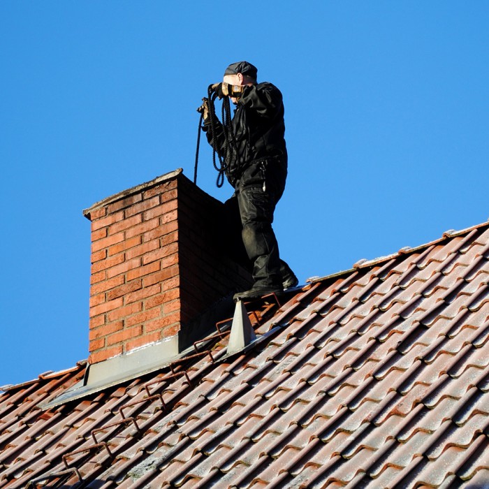 chimney cleaning in Springfield by 5 Star Chimney Service removing soot and creosote buildup safely