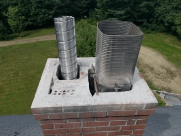 chimney liner installation Springfield by 5 Star Chimney Service installing stainless steel chimney liner safely