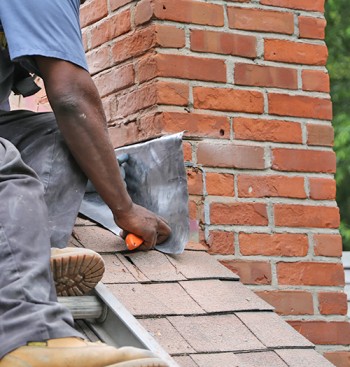 professional chimney leak repair in Andover MA fixing water intrusion flashing damage and chimney masonry problems