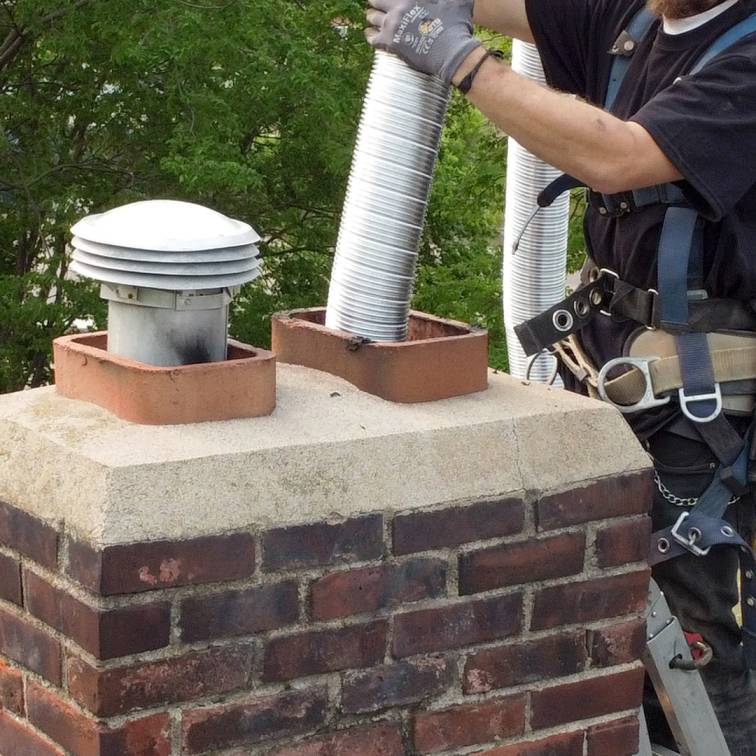 professional chimney repair services in Andover Massachusetts repairing masonry leaks and chimney damage