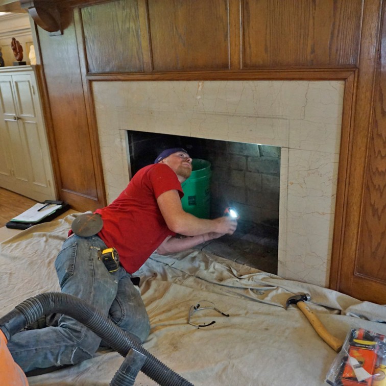 professional fireplace inspection in Worcester Massachusetts evaluating fireplace safety chimney condition and venting performance