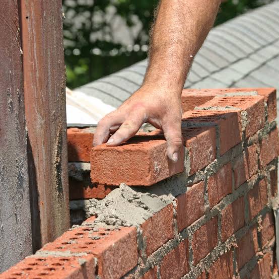 professional chimney rebuild in Andover Massachusetts restoring damaged brick chimney and structural masonry components